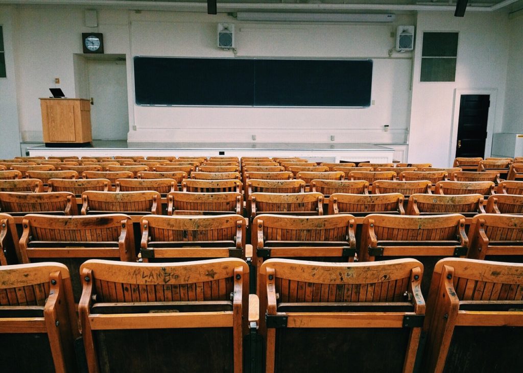Wooden chairs in a lecture room