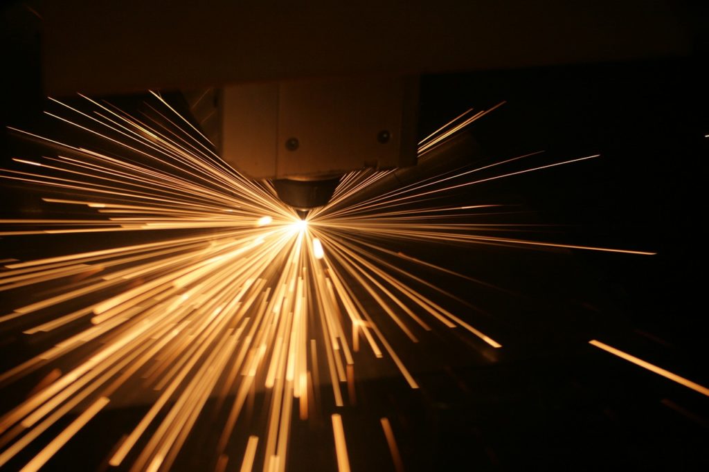 CNC Machine cutting and producing sparks