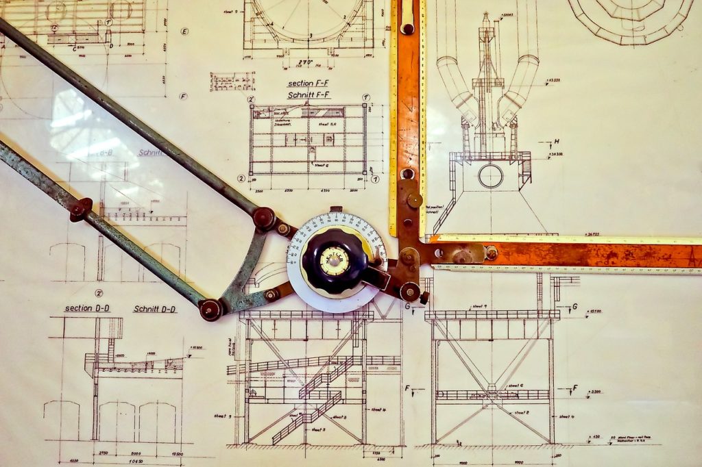 Technical drawing with instrument lying on top