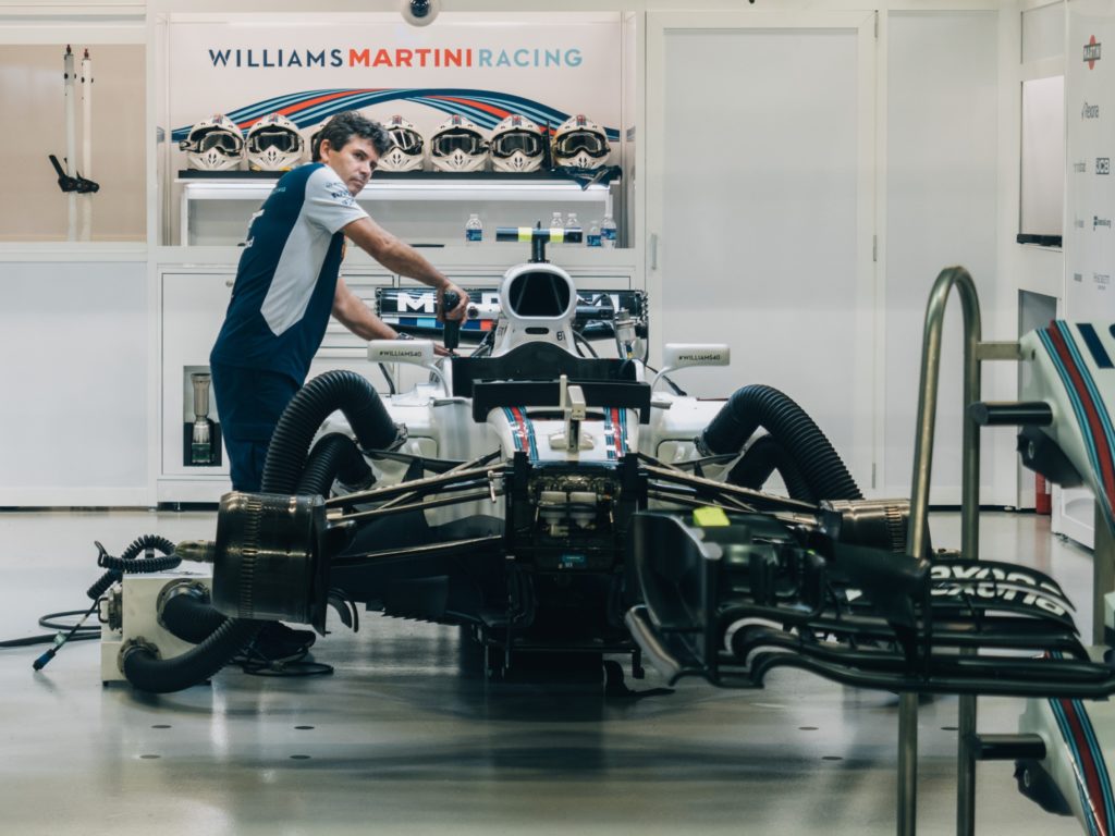 Man working on a Formula One car
