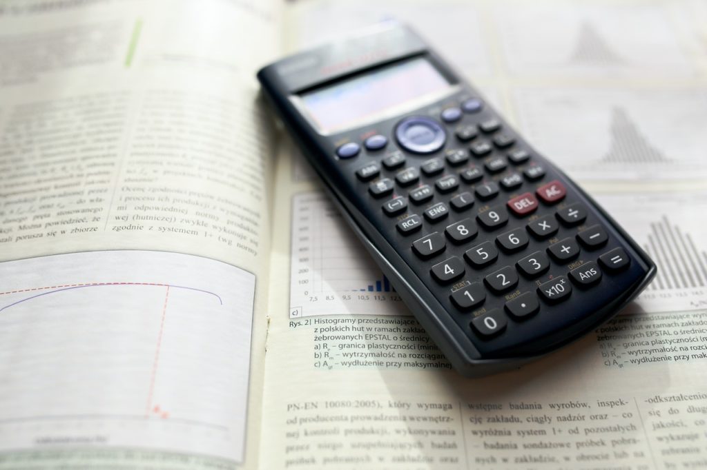 Scientific calculator on a book