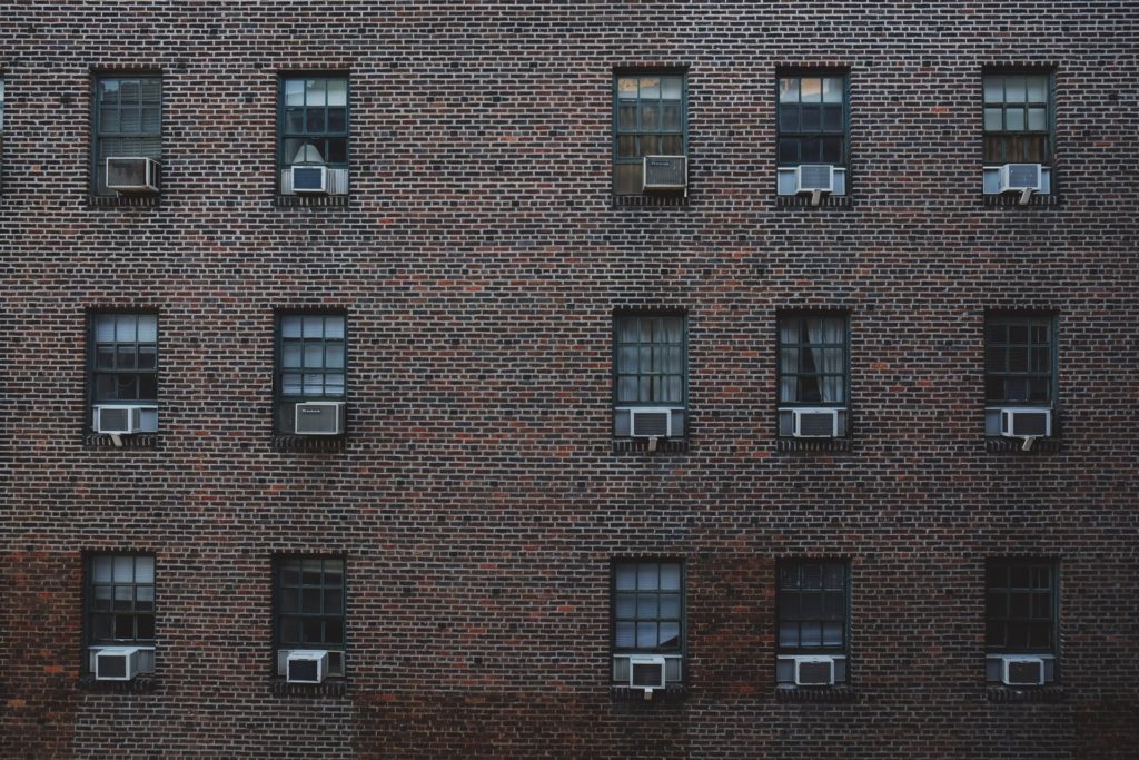 Window units in apartment windows