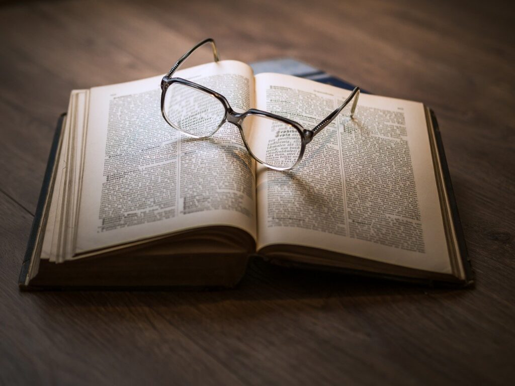 Reading glasses on a book