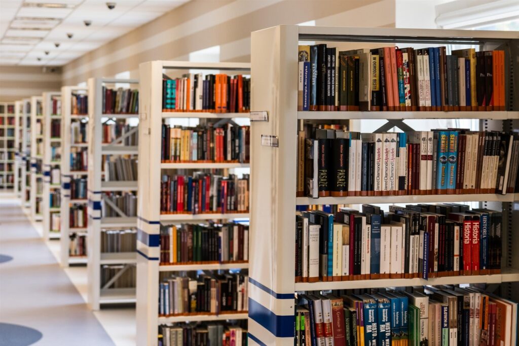 Bookshelves in library full of books
