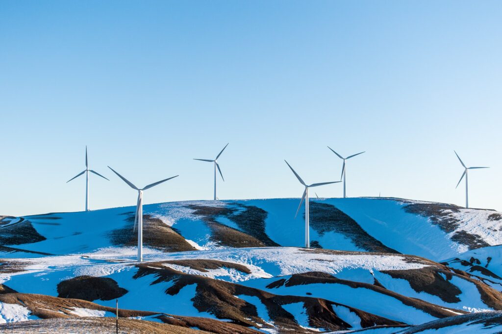 Wind farm on a snowy hill